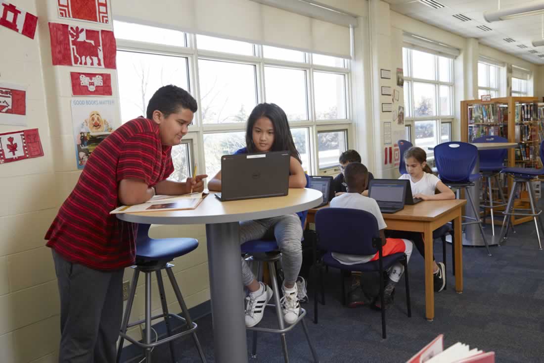 This is an image of a teacher addressing a classroom.